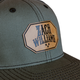 Baseball-style cap with a ’Zach Williams’ patch on the front.