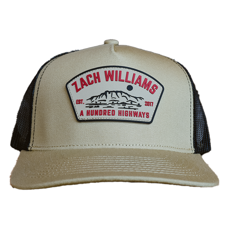 Trucker-style baseball cap with a ’Zach Williams A Hundred Highways’ patch on the front.