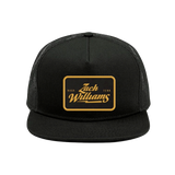 Black trucker hat with a gold ’Zach Williams’ logo patch on the front.