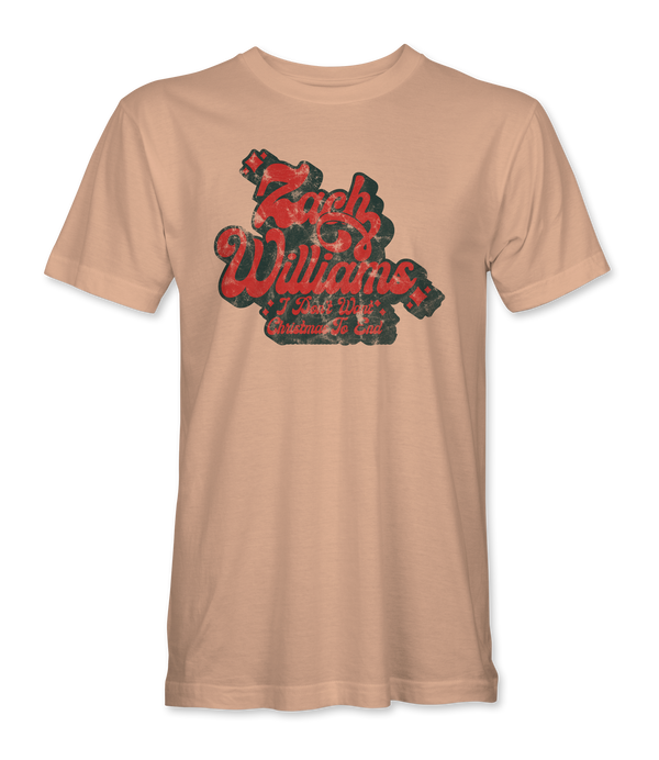 Peach-colored t-shirt with ’Fresh Wildlings’ text in red and black plaid pattern.