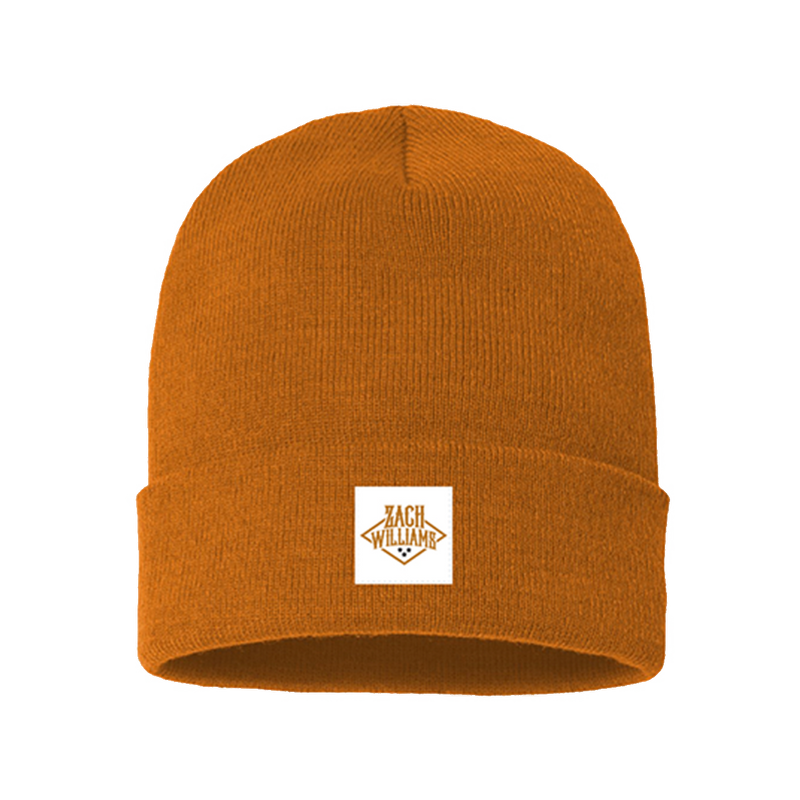 Orange knit beanie with a white square patch on the front.