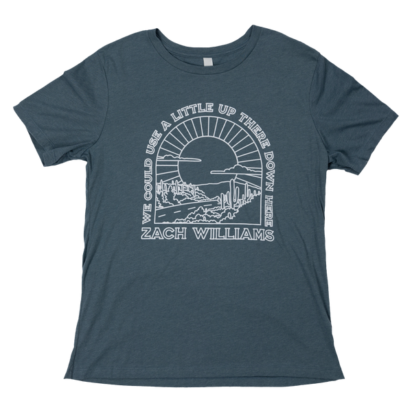 Blue-gray t-shirt with a white circular graphic design and text.