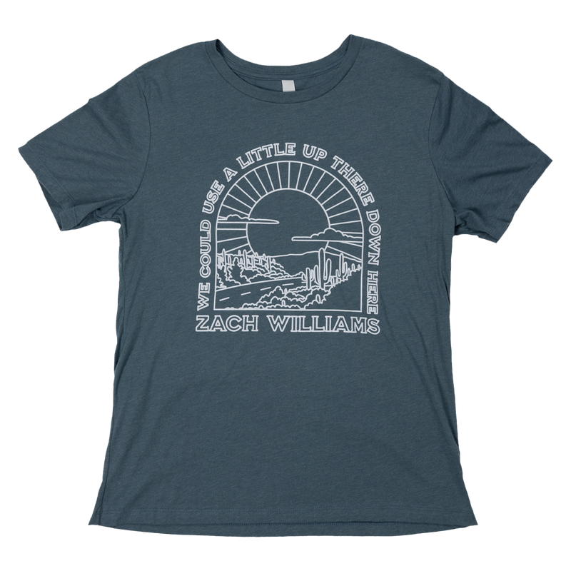 Blue-gray t-shirt with a white circular graphic design and text.